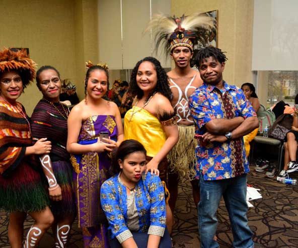 students wear traditional clothing from different cultures