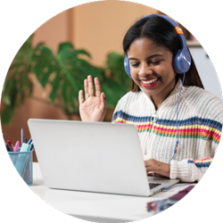 a young woman working on a laptop